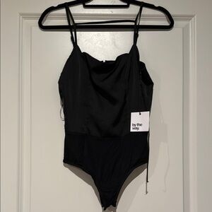 Black Bodysuit by the way.